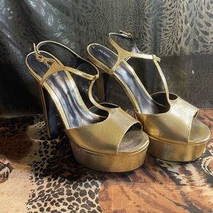Also Gwalevia Gold Platform Heels